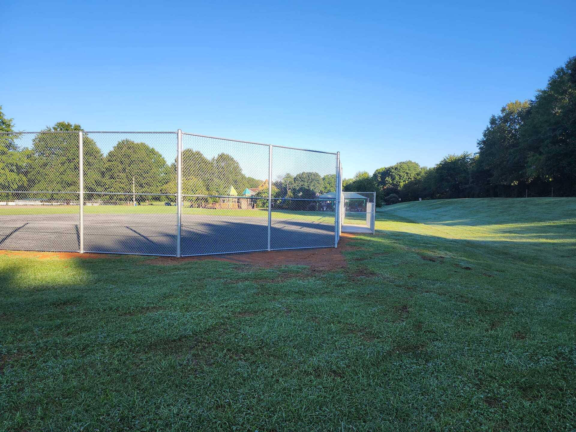 chain link fence enclosing kids park