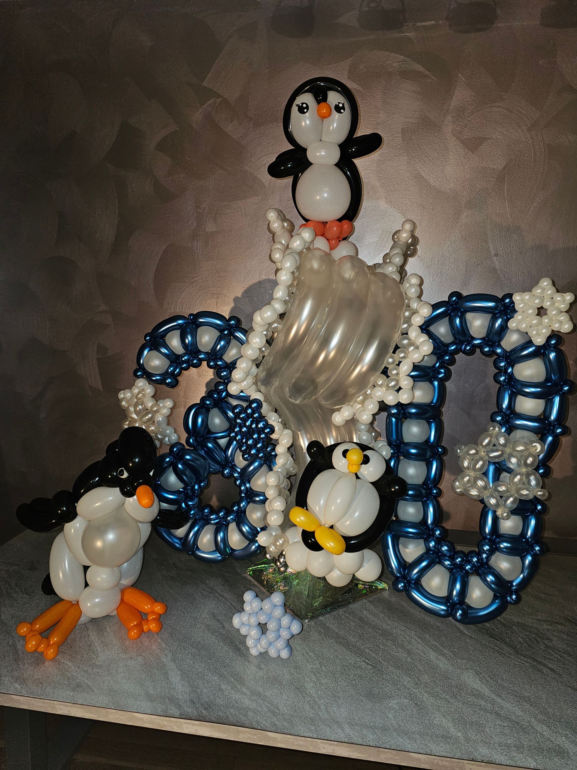 Balloon sculpture of penguins and 