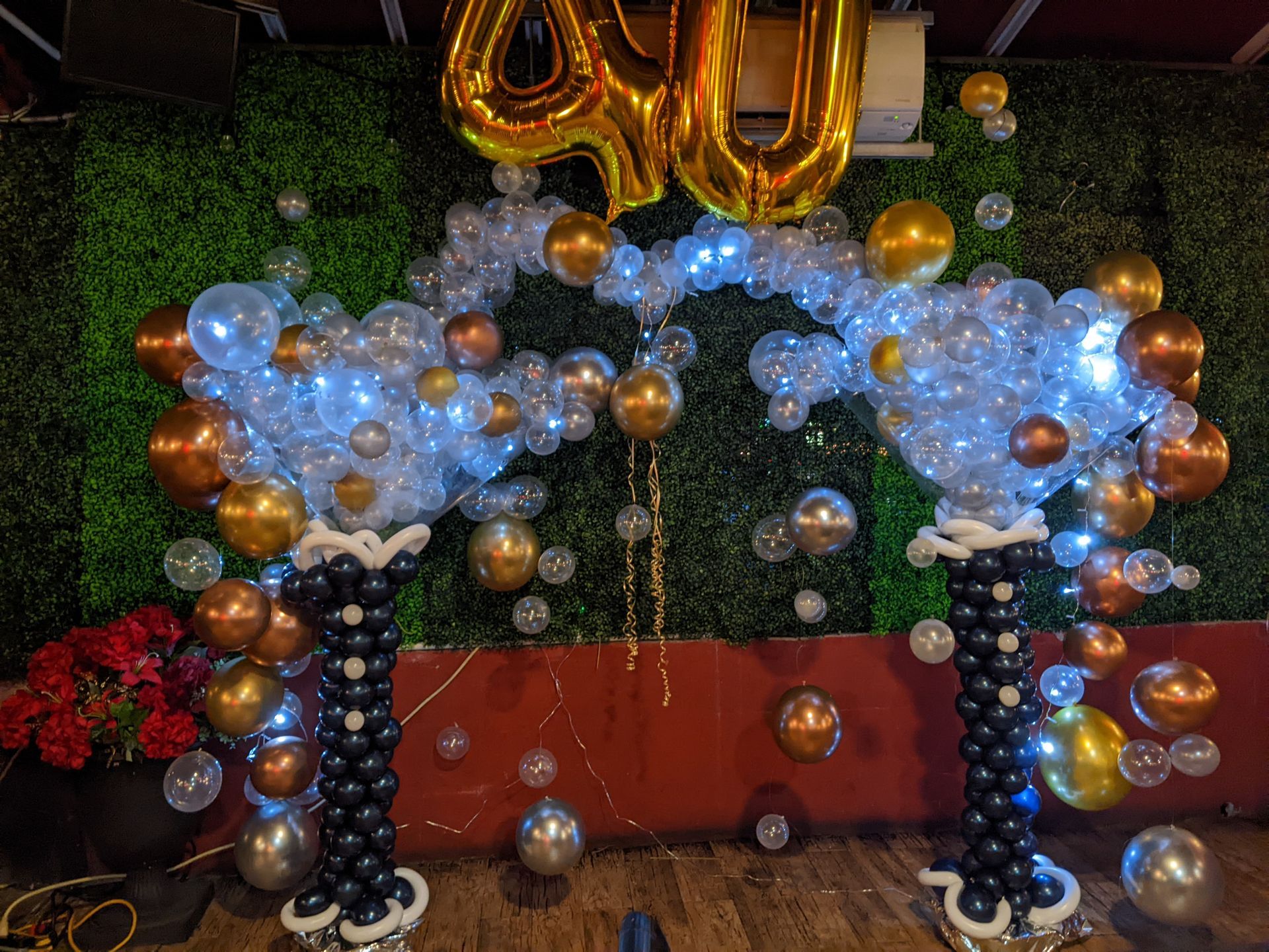 A party setting with a balloon arch, 
