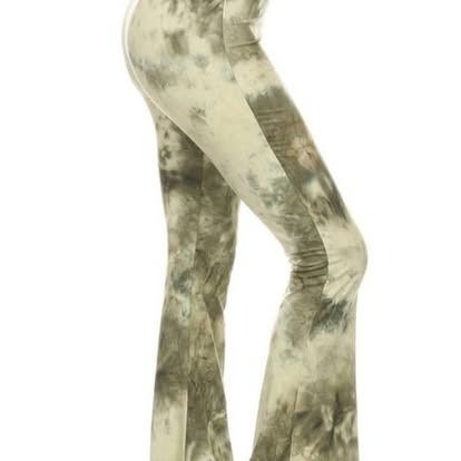 Tie-dye flared pants in shades of green and beige.
