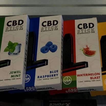 CBD disposable vapes in Jewel Mint, Blue Raspberry, and Watermelon Blast flavors.
