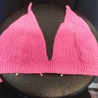 Pink crochet halter top.