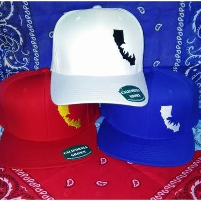 Four California-shaped hats: red, white, and blue, with a bandana backdrop.