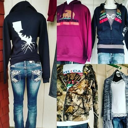 Clothing display: Hoodies and jeans with California-themed designs on mannequins in a store.