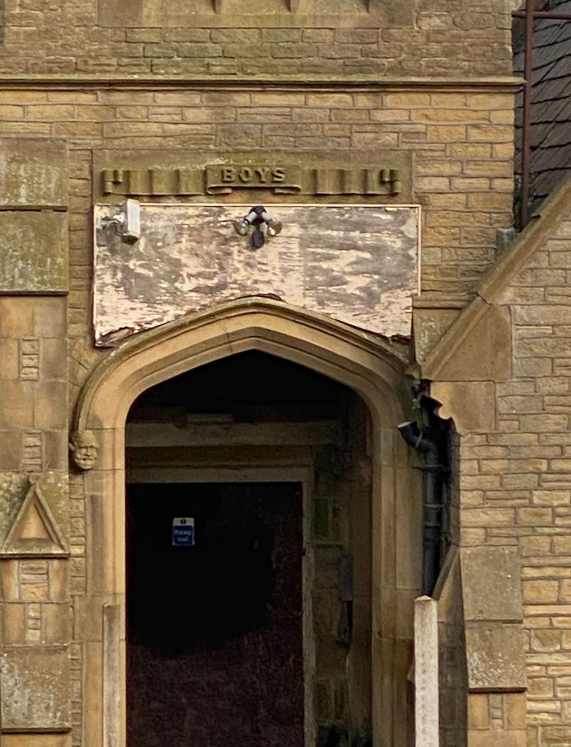 boys entrance to abandoned school