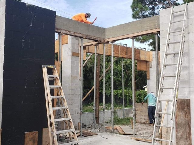 Man Working on the Roof — Cape Coral, FL — Channel Mark Shell