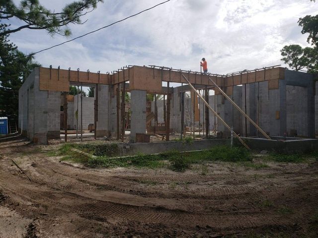 Man Standing on the Building — Cape Coral, FL — Channel Mark Shell