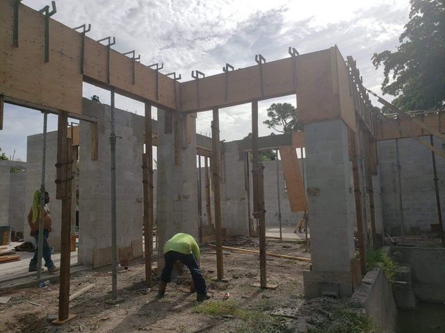 Workers on the Construction Site — Cape Coral, FL — Channel Mark Shell