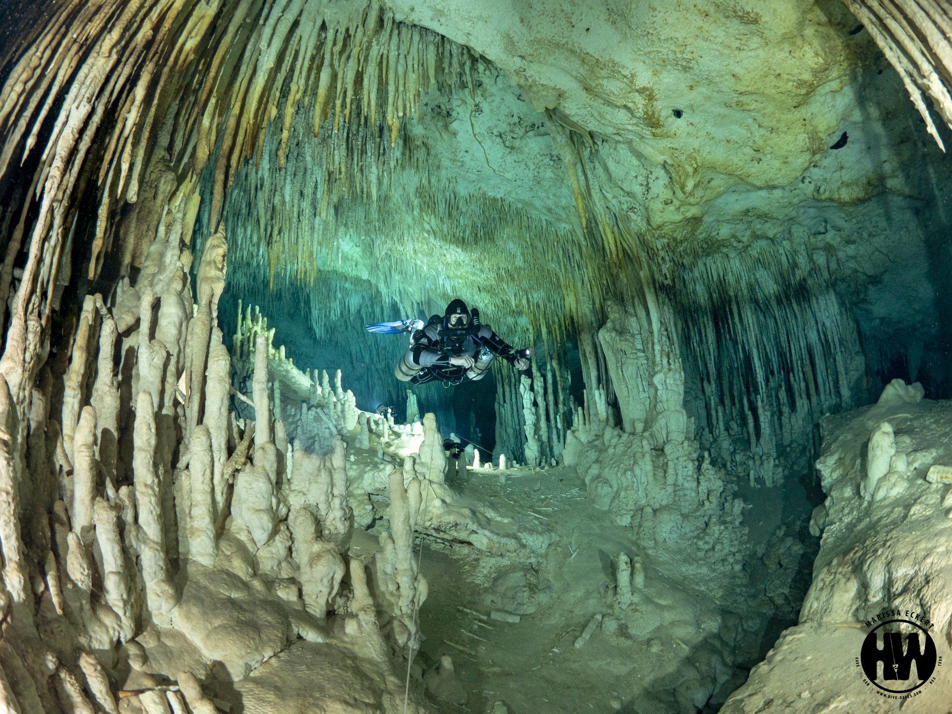 Divers wears gear for cave underwater