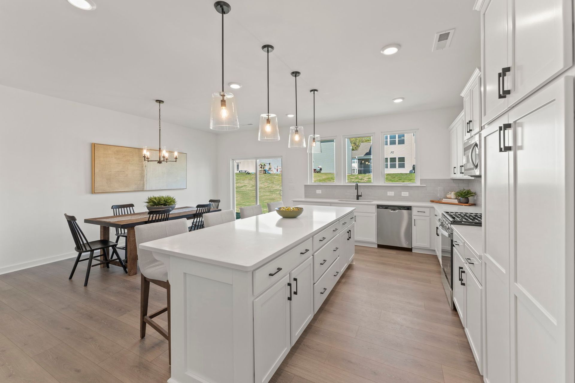 There is a large island in the middle of the kitchen.