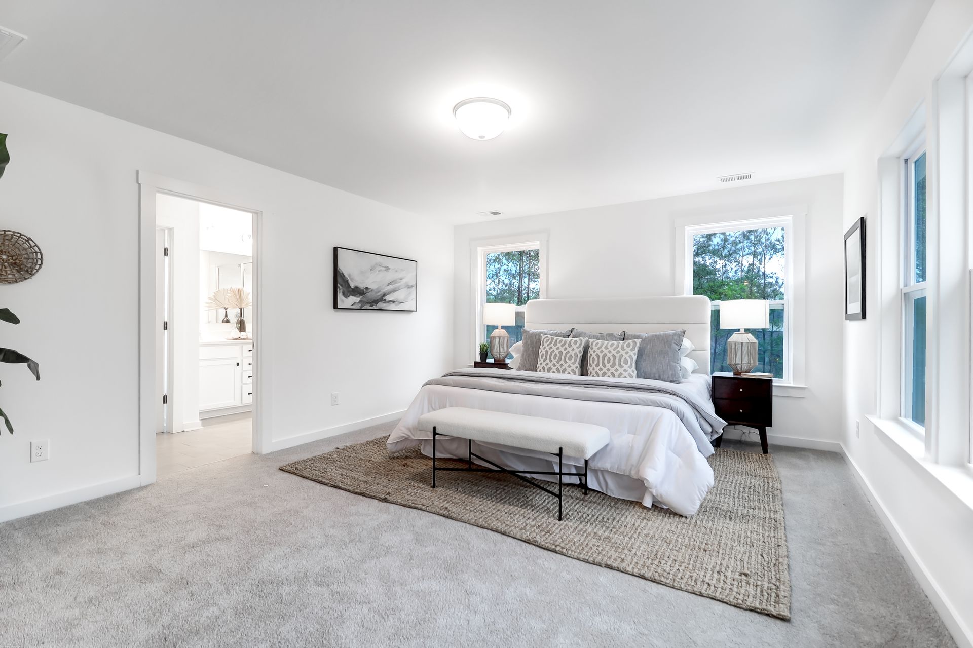 There is a large bed in the middle of the room.