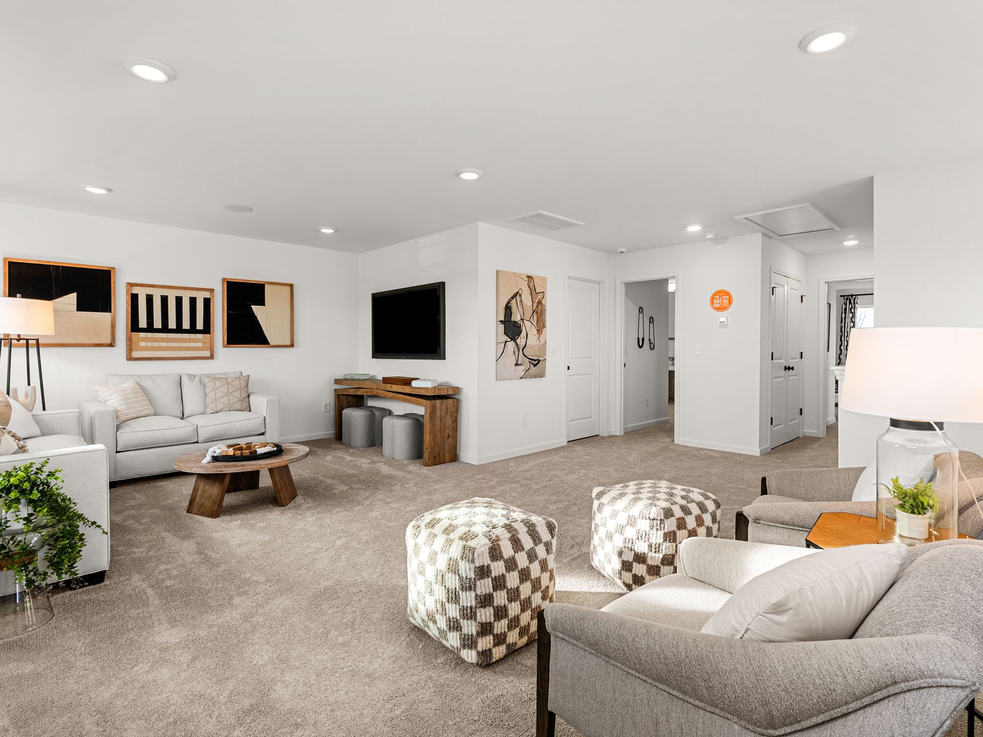 A living room filled with furniture and a flat screen tv.