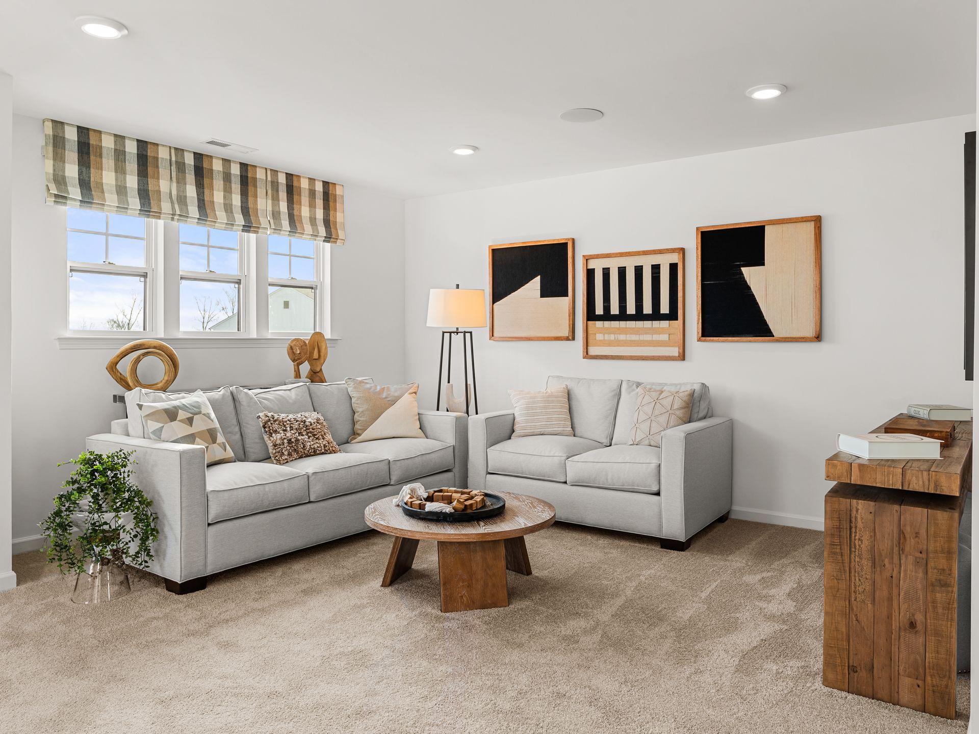 A living room with two couches and a coffee table.