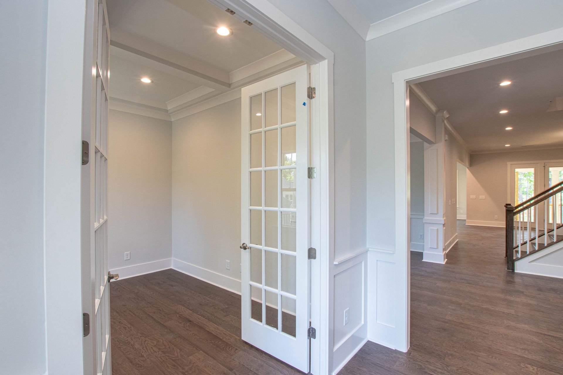 There is a french door in the middle of the room.