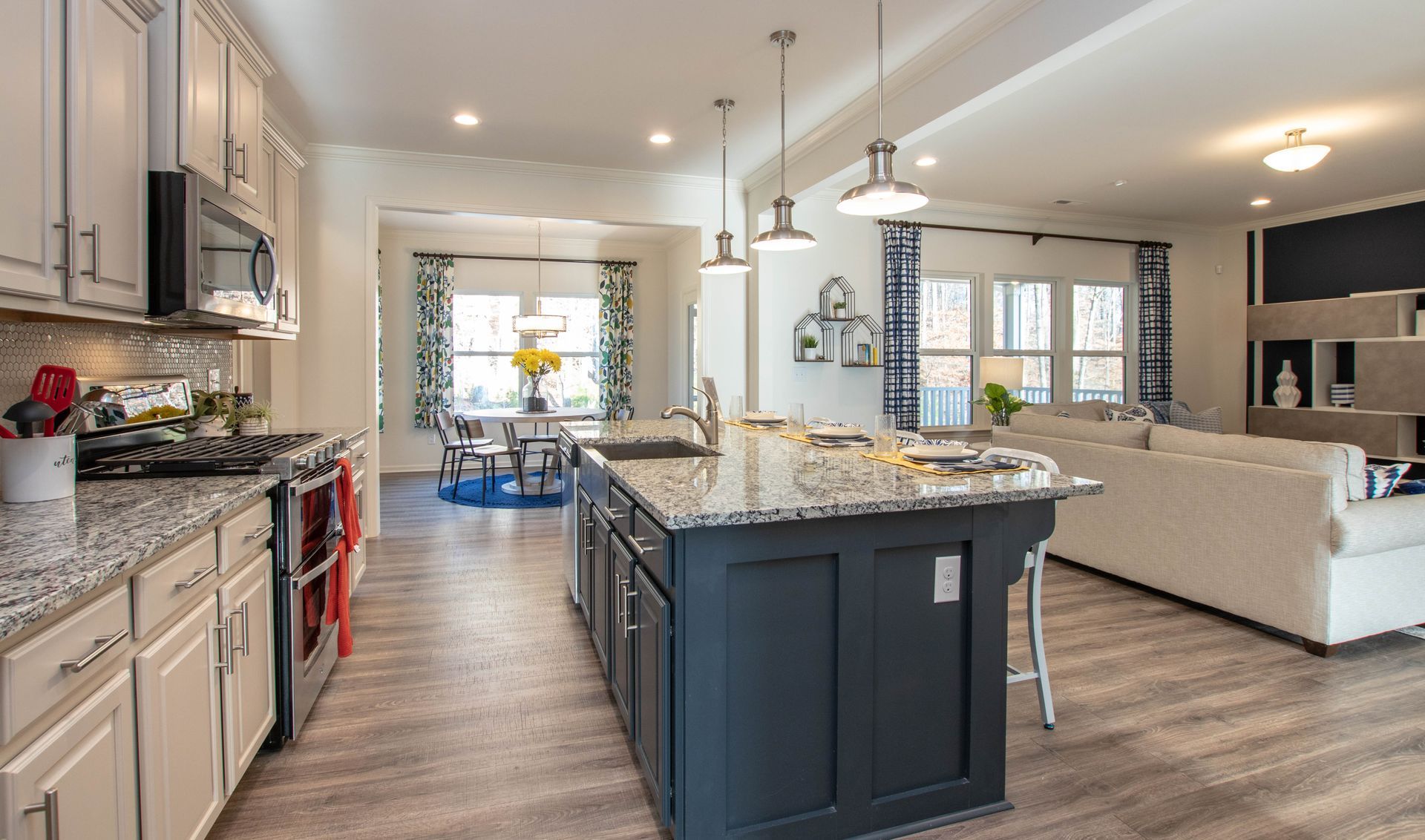 A kitchen with a large island in the middle of the room.