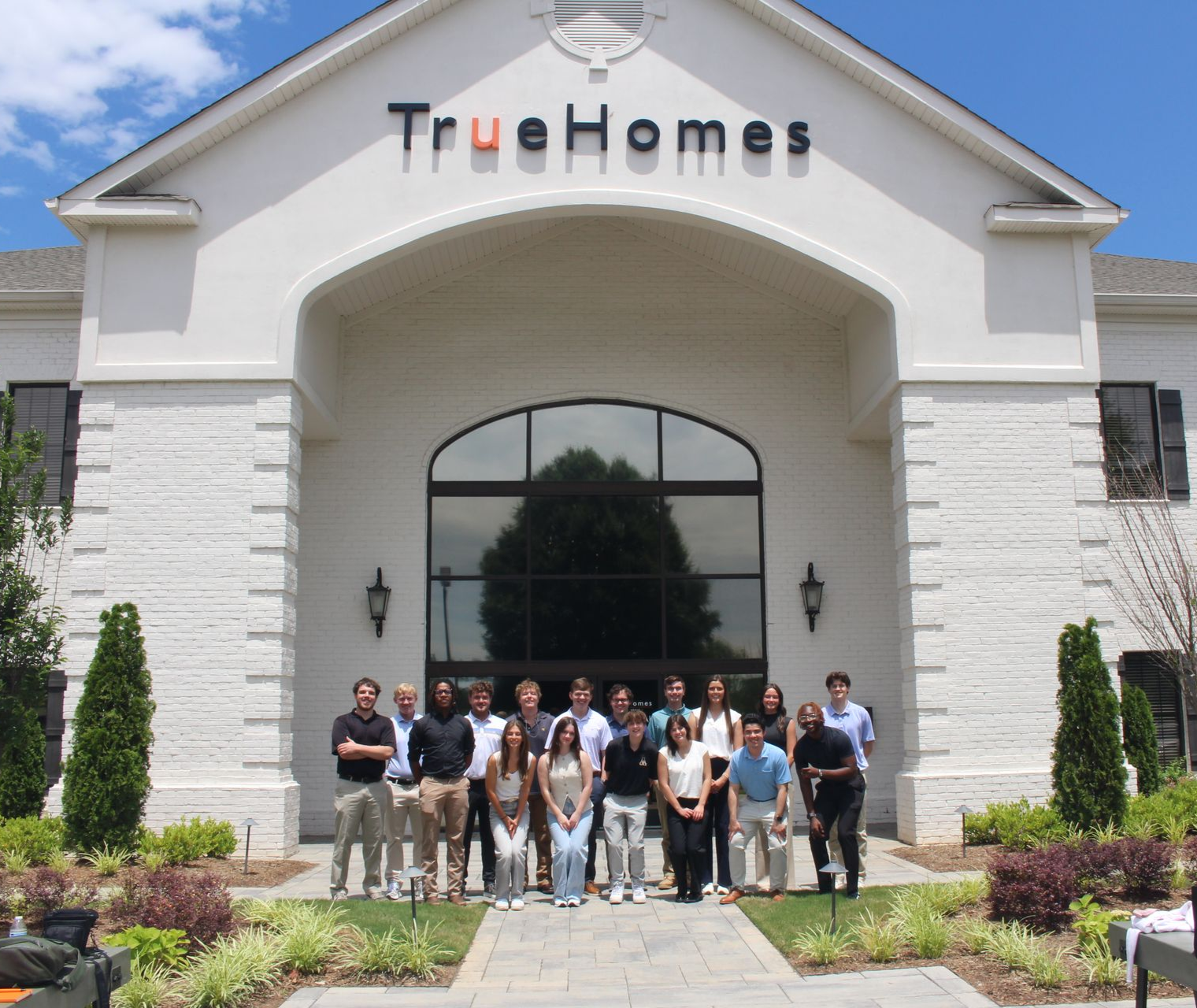 Group of people standing outside a