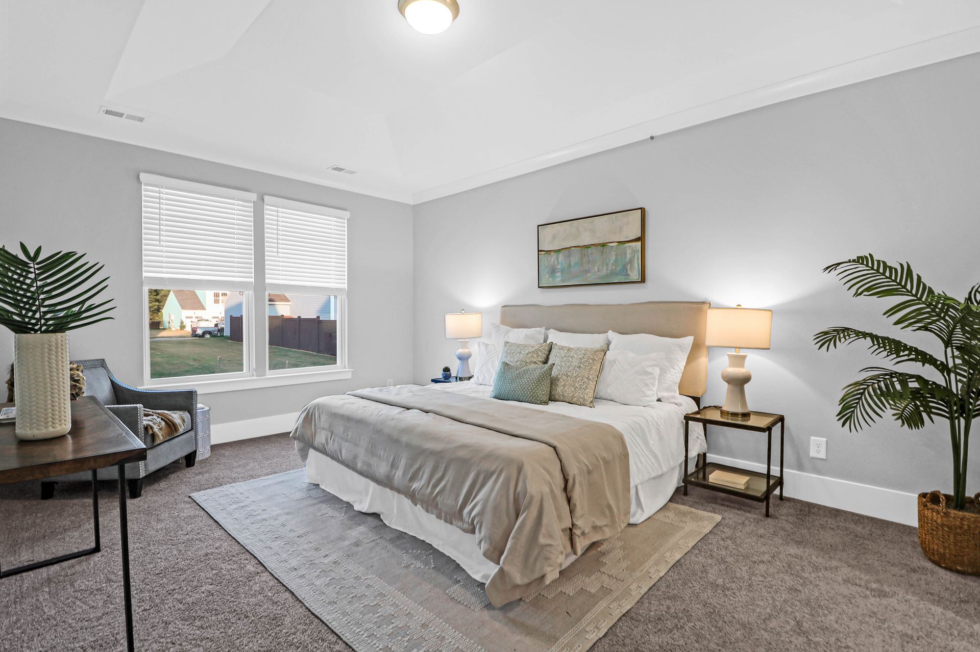 There is a large bed in the middle of the room.