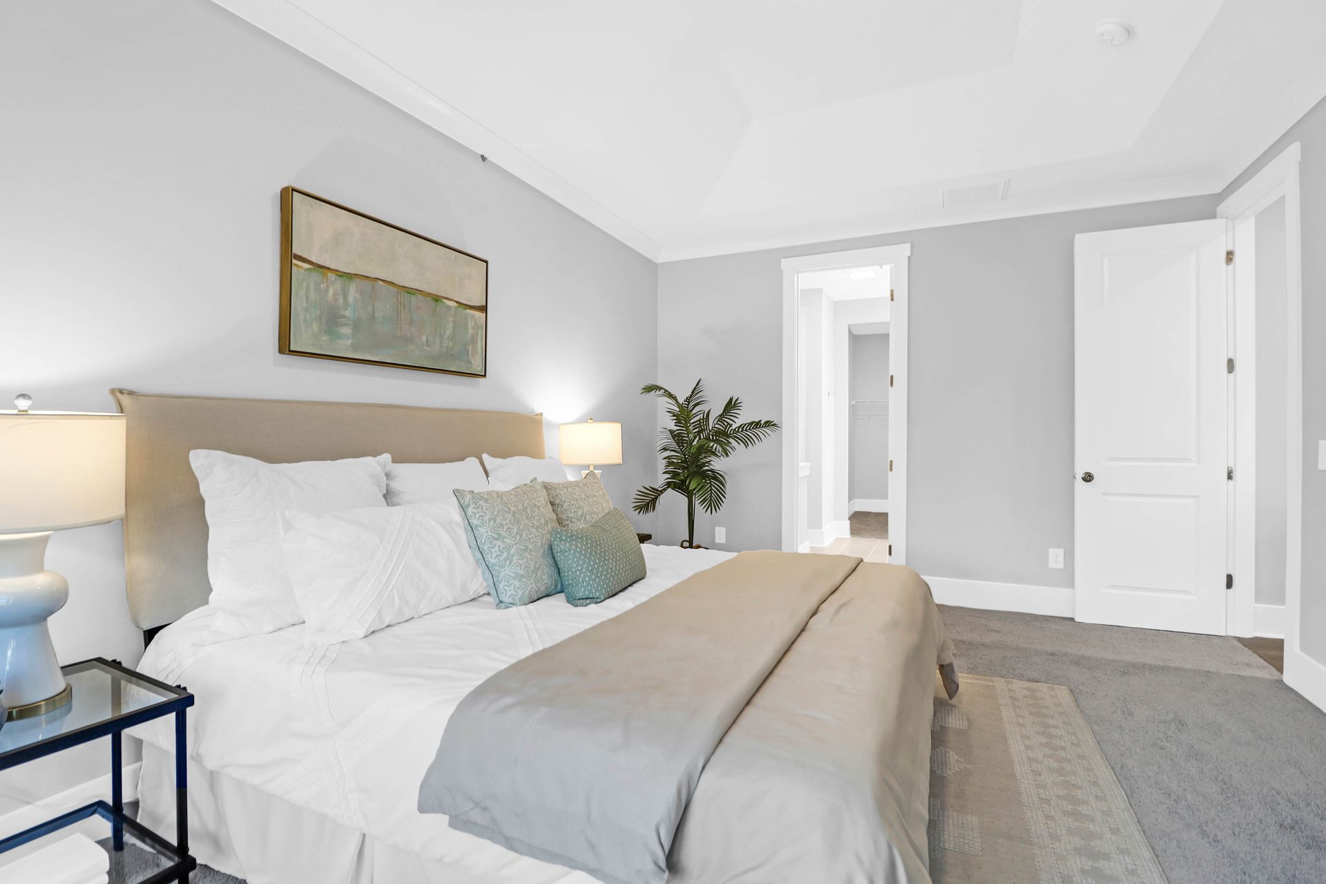 There is a large bed in the middle of the room.