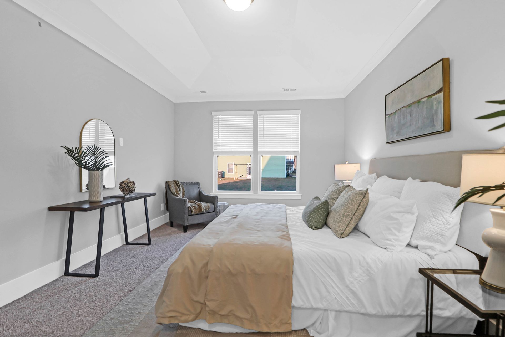 There is a large bed in the middle of the room.