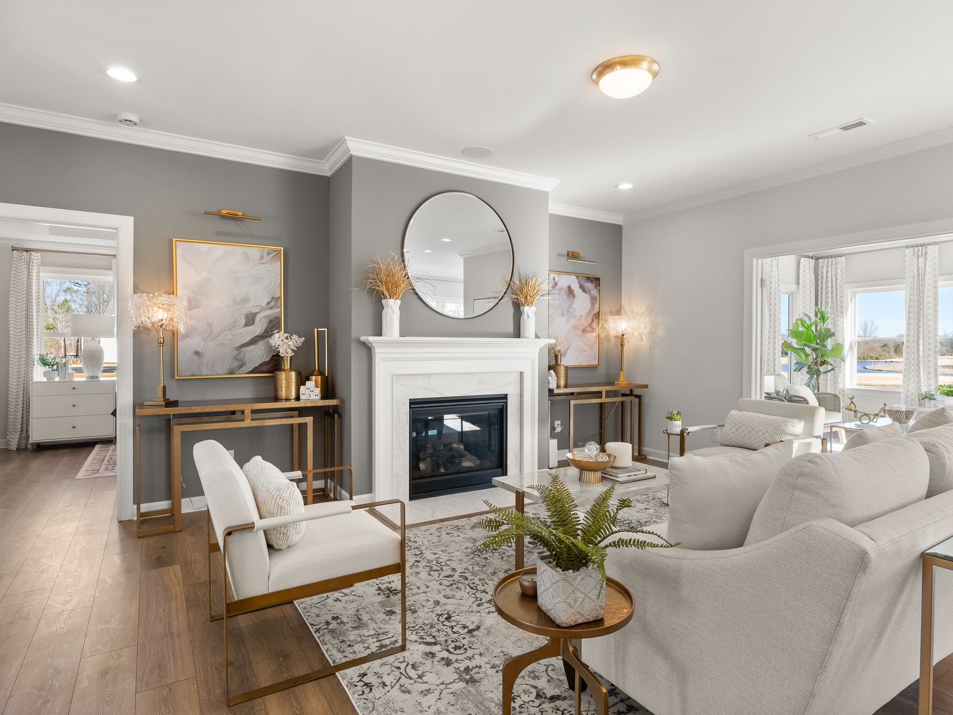 A living room filled with furniture and a fireplace.