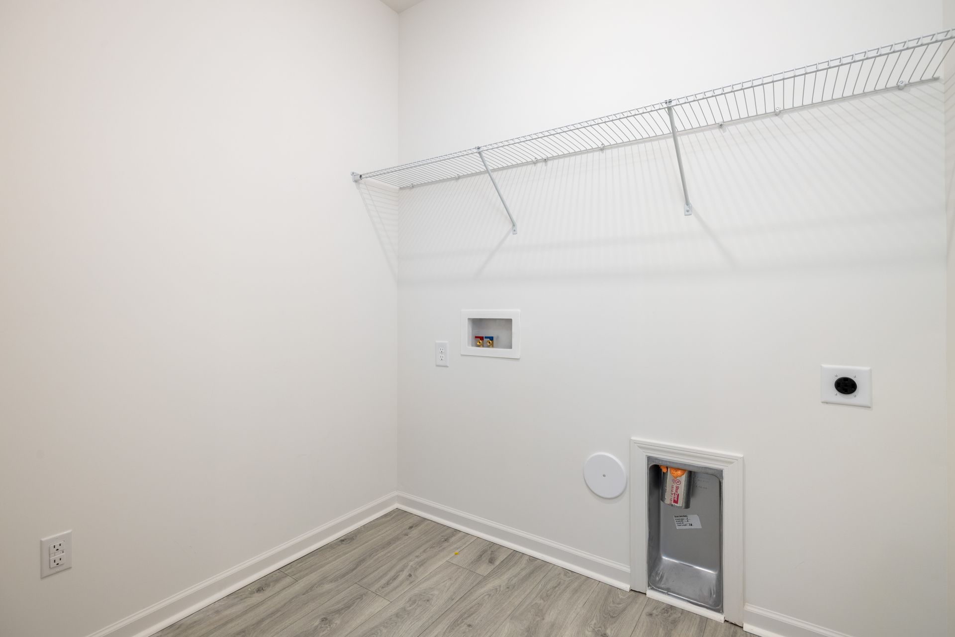 There is a washer and dryer in the laundry room.