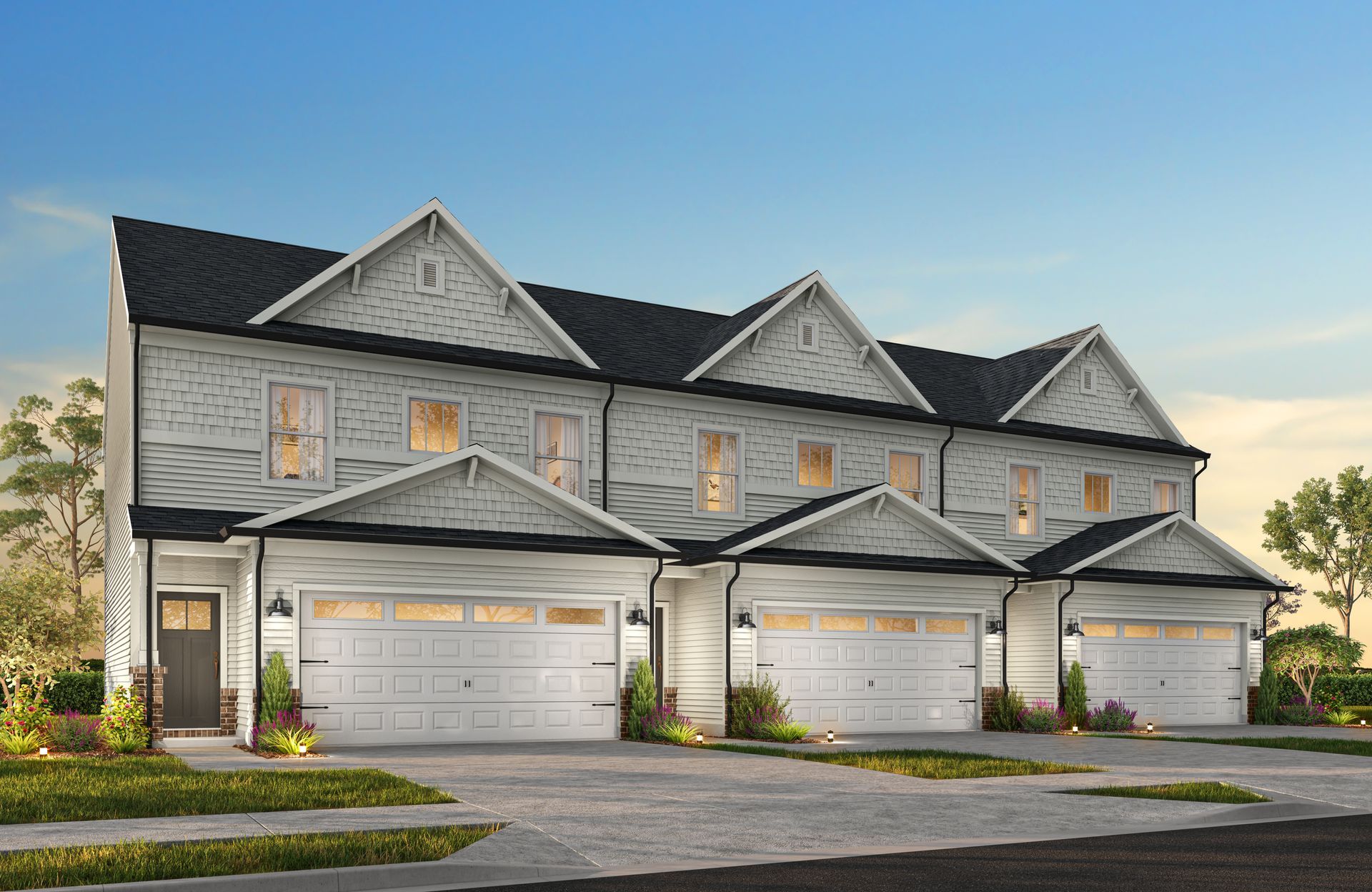 An artist 's impression of a row of houses with garages.