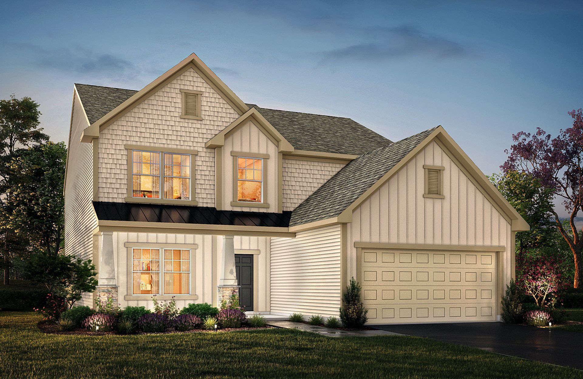 A white house with a garage and a lot of windows is sitting on top of a lush green field.