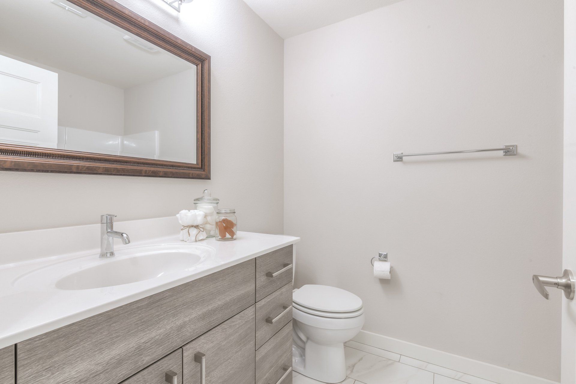 Spacious bathroom in gray tone
