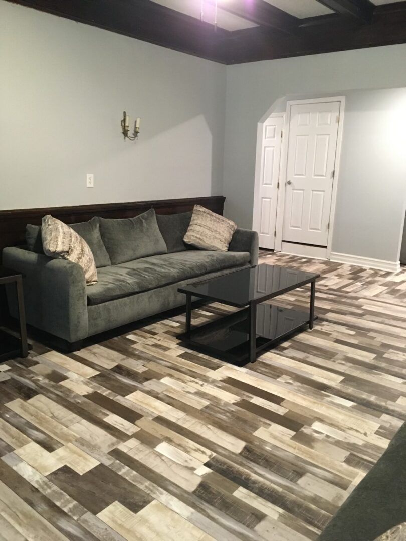 A living room with a couch and a coffee table
