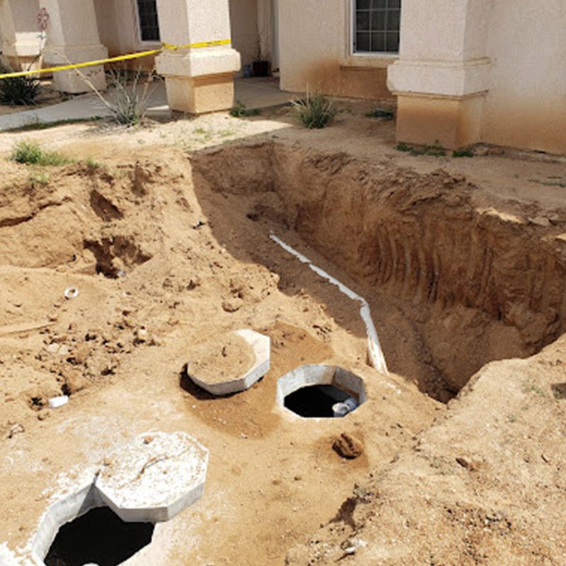 Large Hole in the Ground in Front of a House - Apple Valley, CA - Roto-Rooter Plumbers and Septic Service