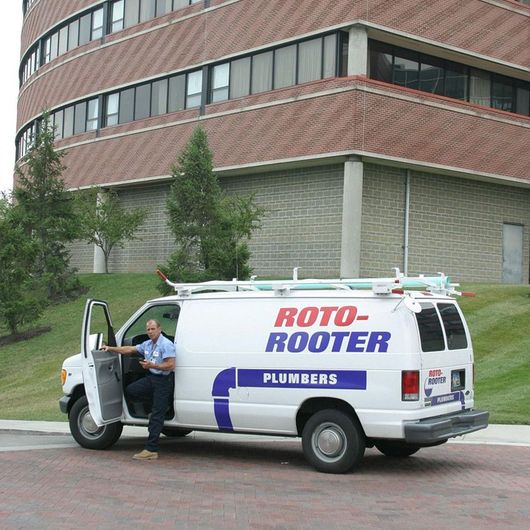 White Roto-Rooter Van Parked in Front of a Building - Apple Valley, CA - Roto-Rooter Plumbers and Septic Service