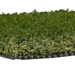A close up of a piece of artificial grass on a white background.