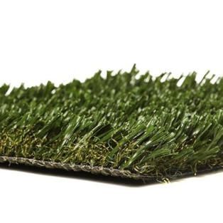 A close up of a piece of artificial grass on a white background.