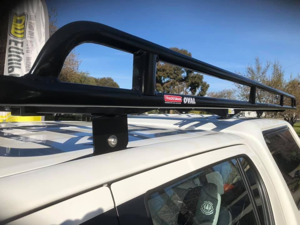 Black Roof Rack Mounted on a White Truck — TJM Albury Pty Ltd in South Albury, NSW