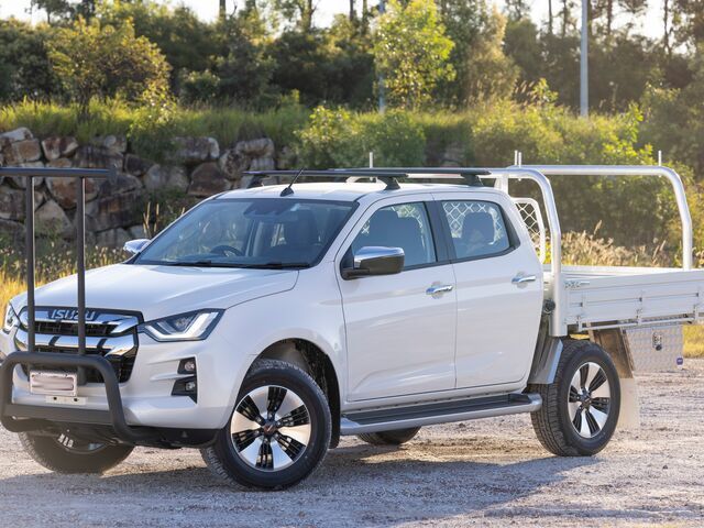 A White Truck With a Tray on the Back is Parked in a Gravel Lot — TJM Albury Pty Ltd in South Albury, NSW