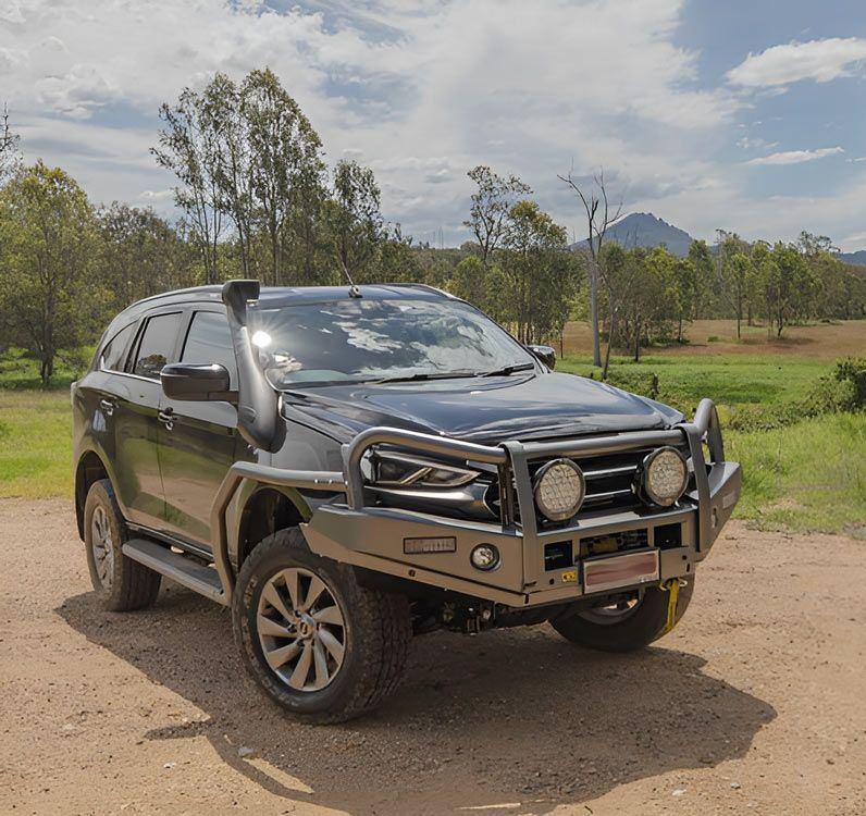 A Black SUV With a Snorkel is Parked on a Dirt Road — TJM Albury Pty Ltd in South Albury, NSW