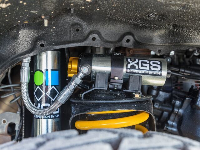 A Close Up of a Suspension System With a Hose Attached to It — TJM Albury Pty Ltd in South Albury, NSW