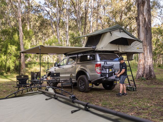 A Man is Putting a Tent on Top of a Truck — TJM Albury Pty Ltd in South Albury, NSW