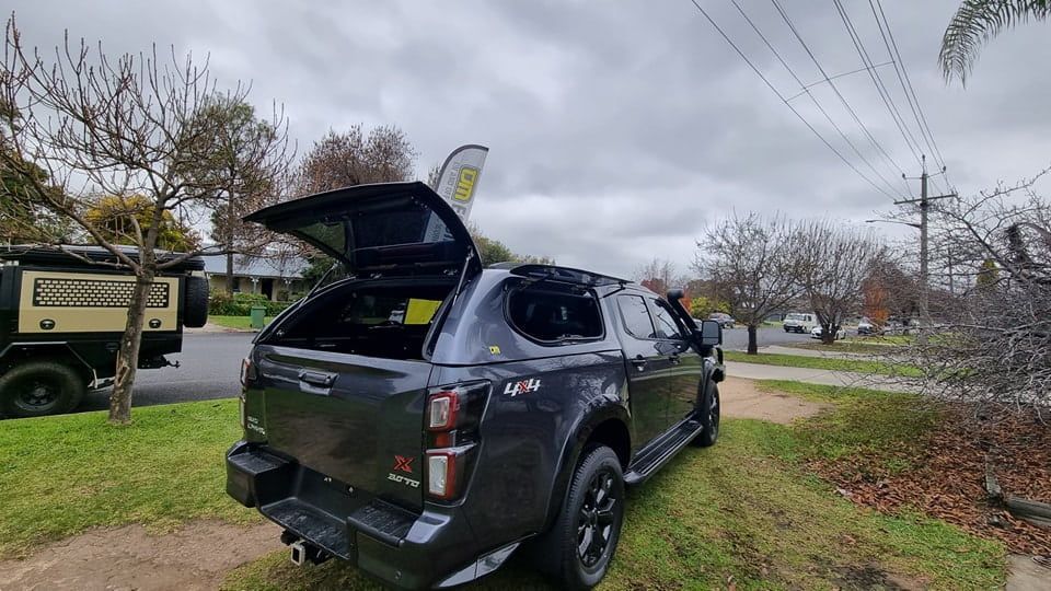 Dark Grey Pickup Truck With Open Rear Canopy — TJM Albury Pty Ltd in South Albury, NSW