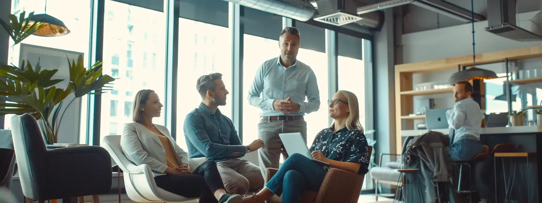 A group of people are having a meeting in an office.