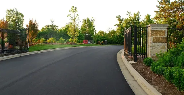 A road with a fence on the side of it