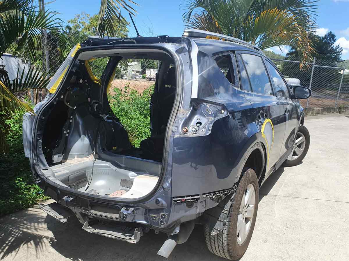 Fixing Back Of Black Car — Panel Beater in Nambour, QLD