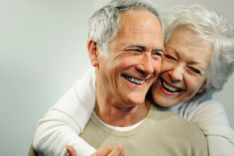 an elderly couple cheerful and happy