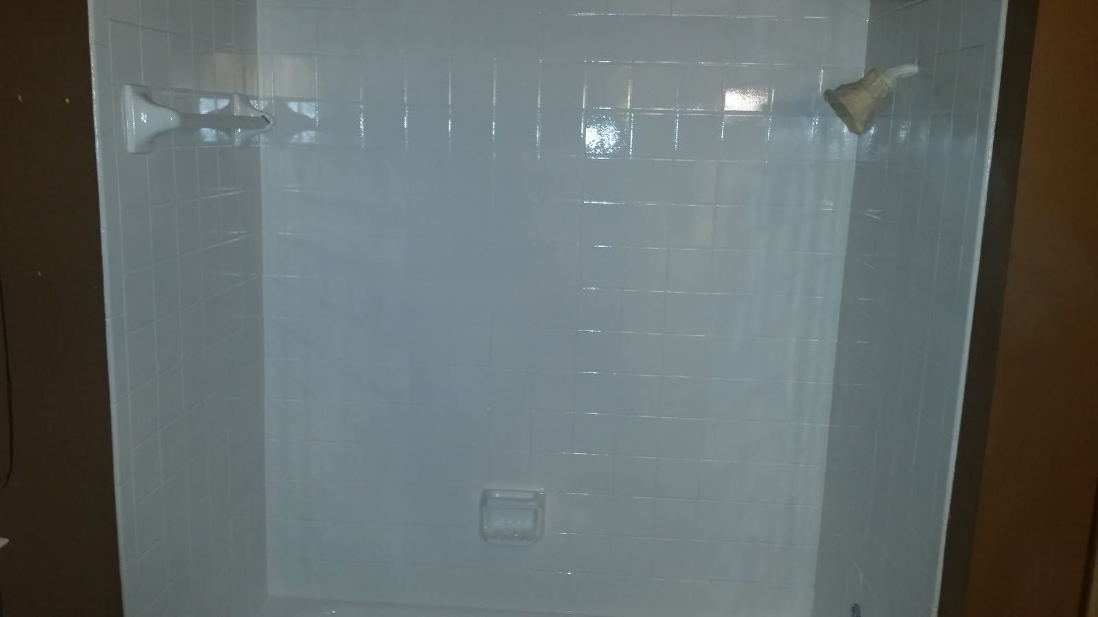 tub with cracked fiberglass after refinishing