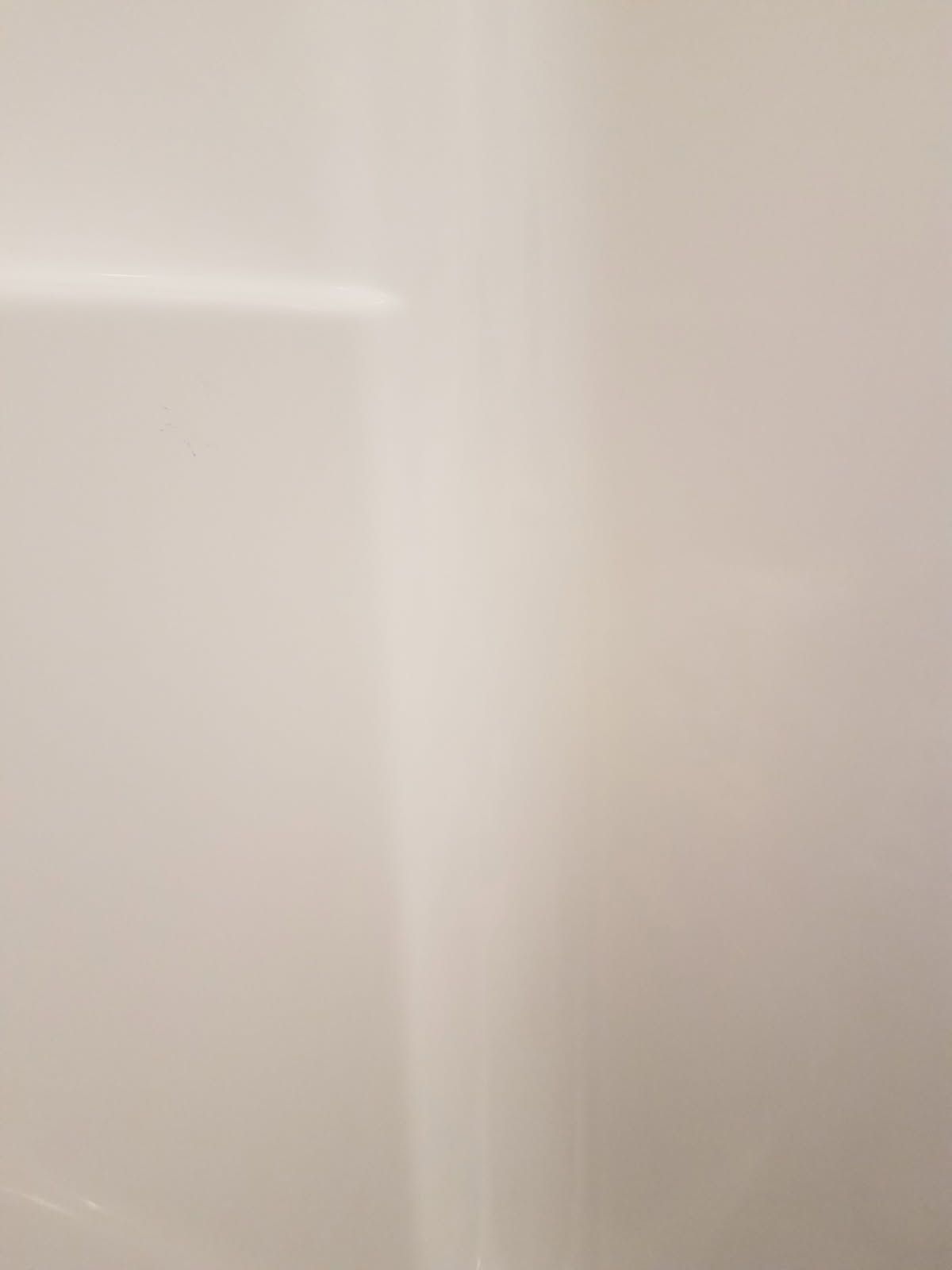 tub with cracked fiberglass after refinishing