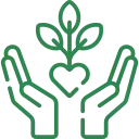 Person pruning a tree with dark purple leaves in a landscaped yard.