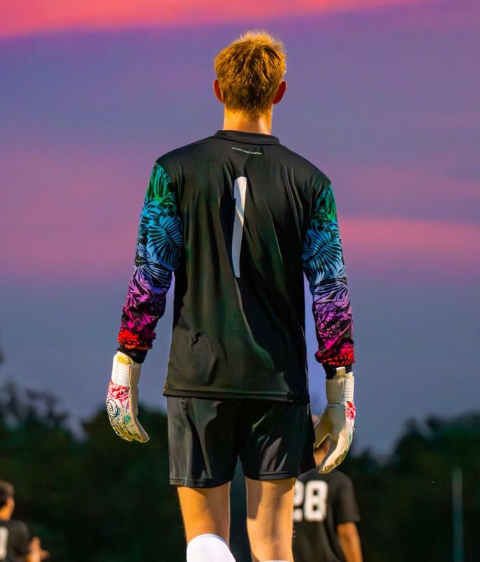 Sporting Arkansas goalie during an evening game.