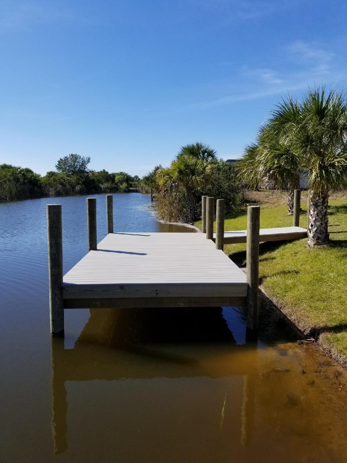Composite dock on natural bank