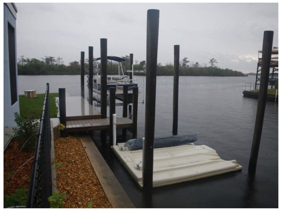 Composite dock with floating PWC platform and boat lift