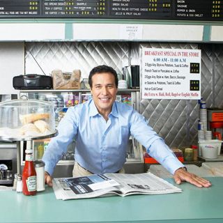 Man standing behind the counter in a classic diner